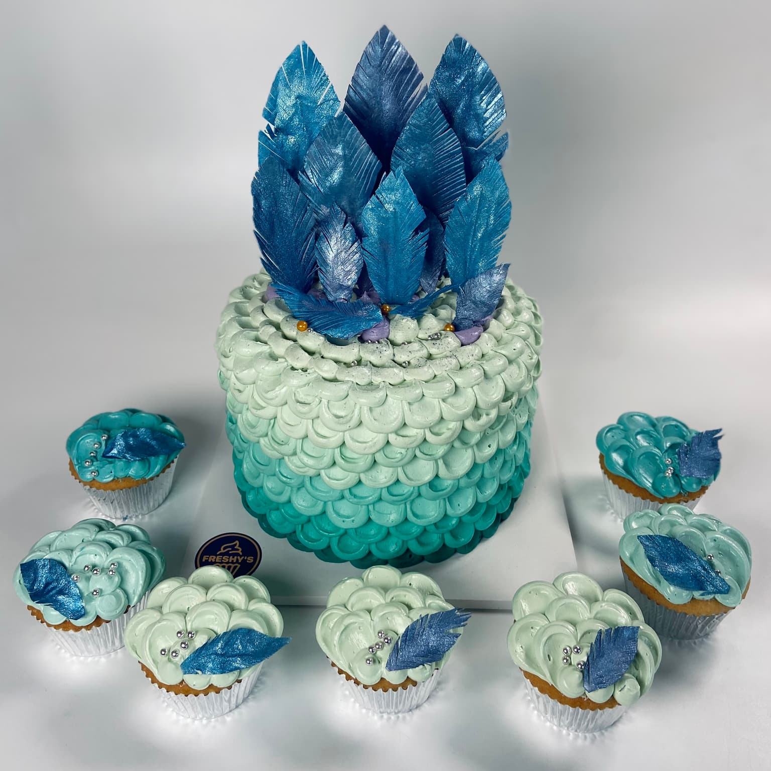 100% edible fondant sculpted custom blue feathers design