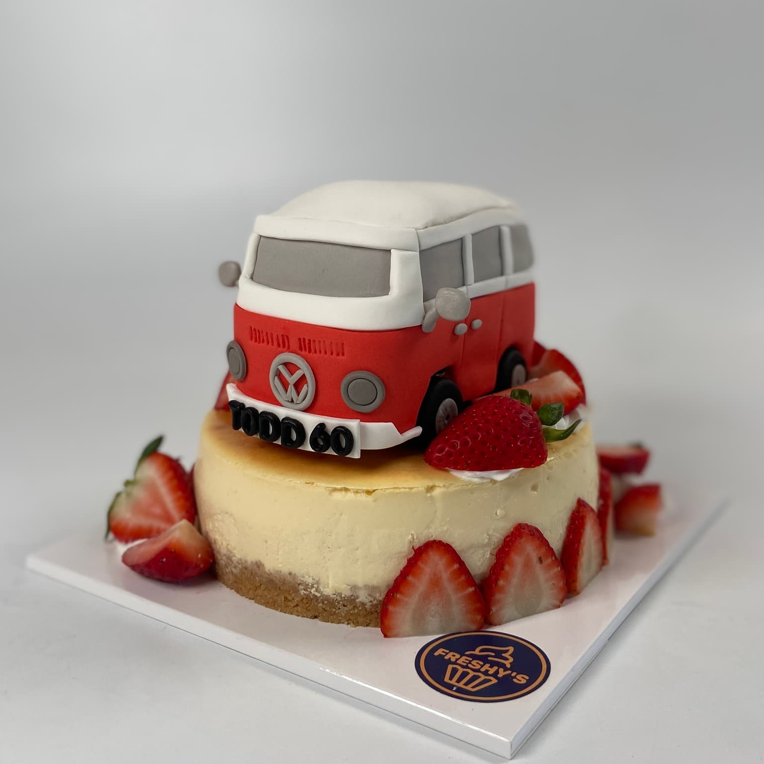 100% edible fondant sculpted VW Combi Van on cheesecake