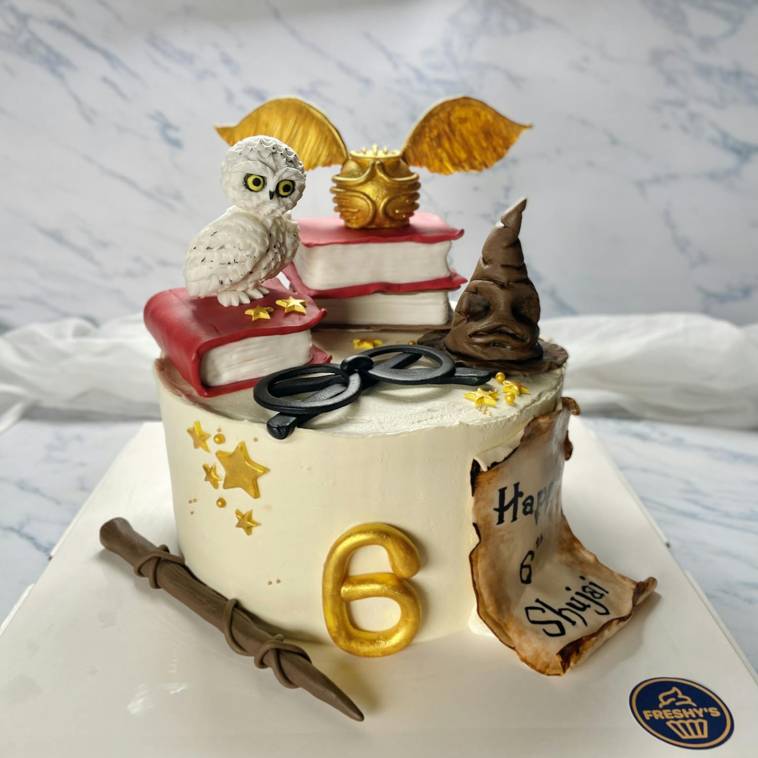 Sweet Cherub Edible Art and Printing - Harry potter baby shower cake.  Buttercream finish with buttercream and fondant details, with a delicious  blackforrest cake on the inside.😋 Please be aware I will