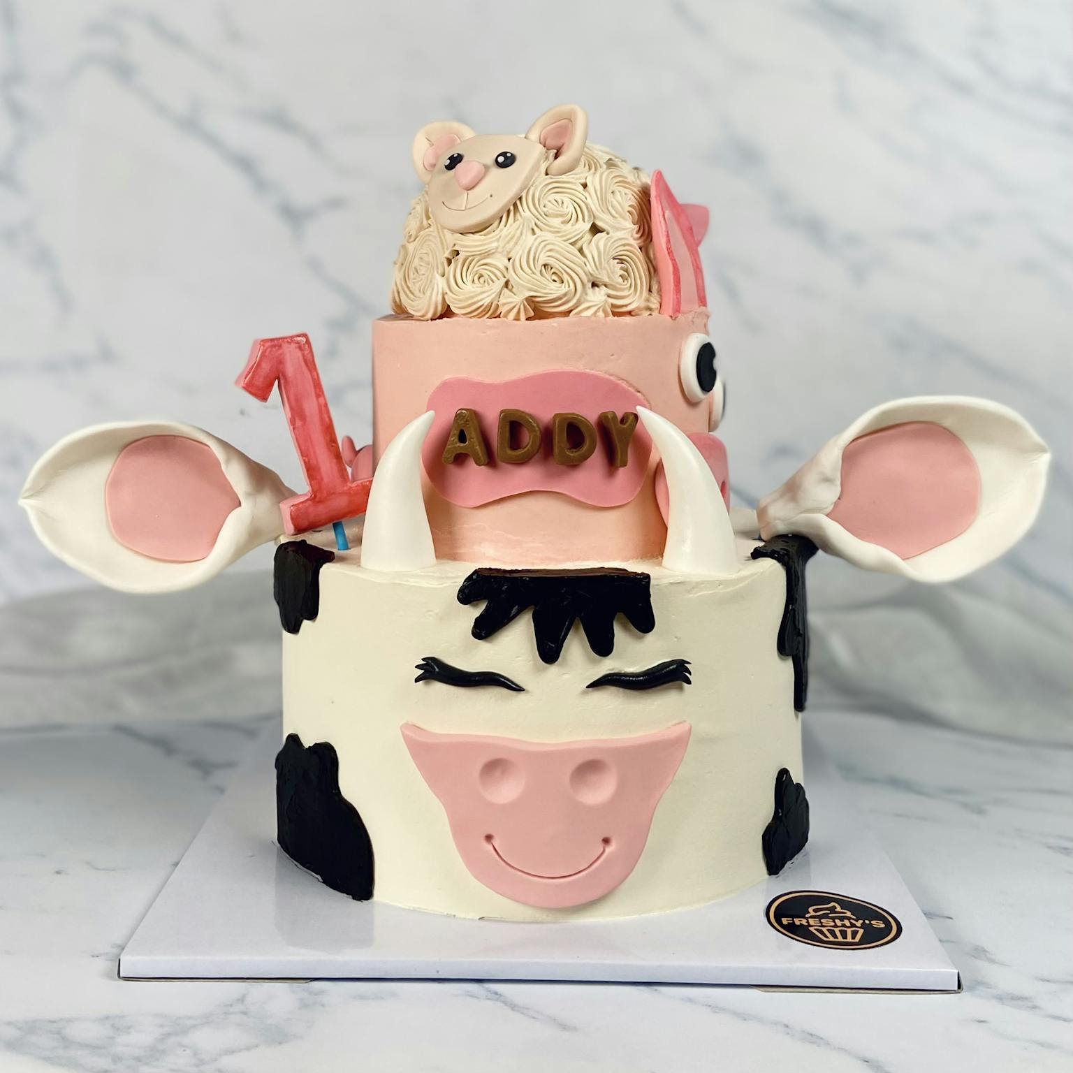 100% edible fondant sculpted cow themed cake