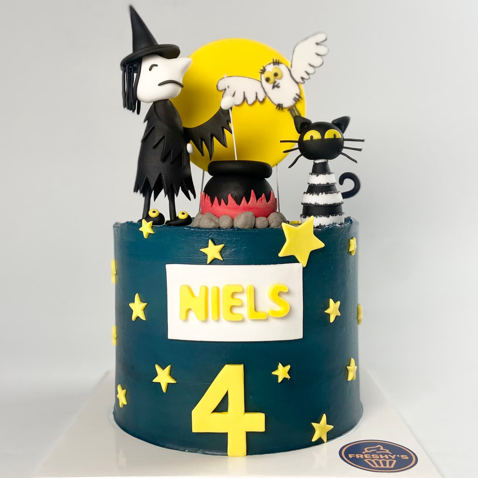 100% edible fondant sculpted Meg and Mog themed cake